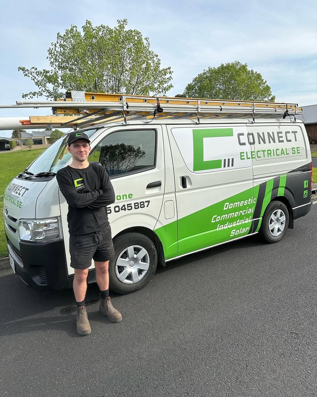 Mac, one of the Connect crew, in front of a signwritten Connect van